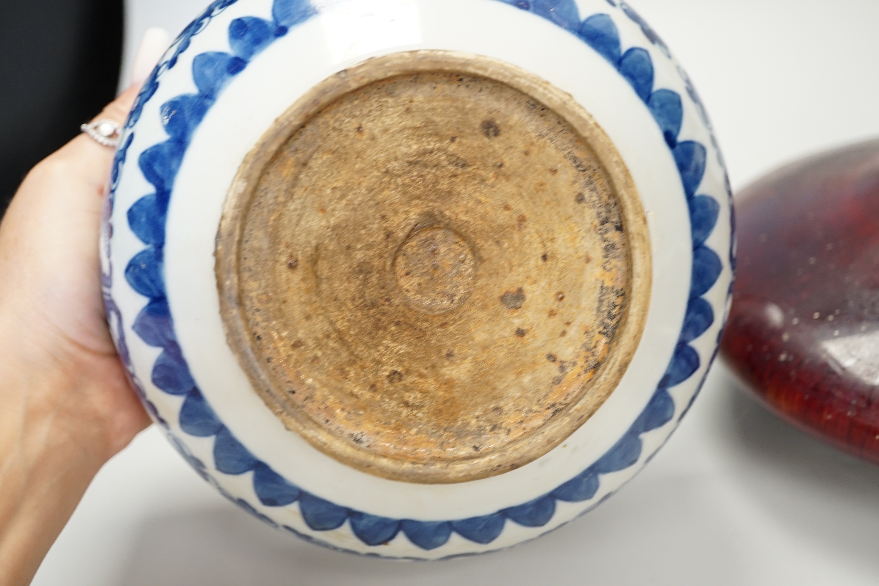 A Chinese blue and white bowl and flambe vase with four character mark to base. Vase 20cm wide